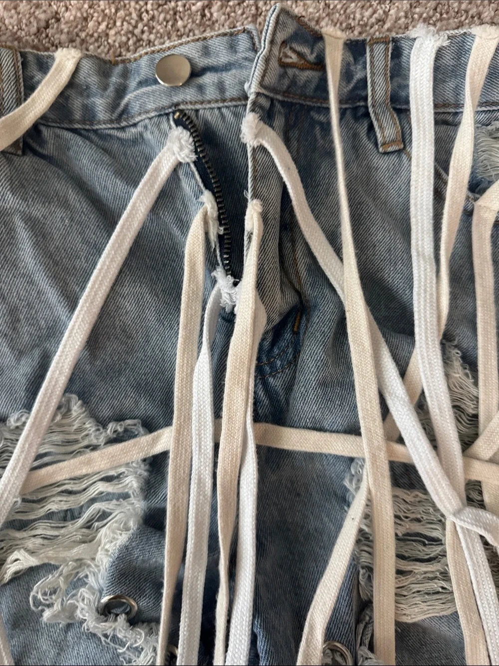 Distressed Light Blue Denim Shoe Lace Grommet Fringe Shorts